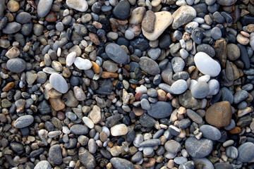 Sea shore pebbles texture. Background for banner, backdrop or texture for 3D mapping