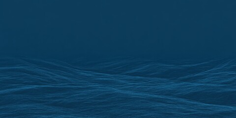 A serene, deep blue ocean surface with gentle waves, creating a tranquil and calm atmosphere.