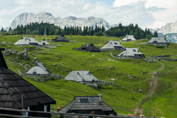Velika Planina, Kamnik, Slovenia. Lord of the Rings style village. Wooden typical houses, hills,...
