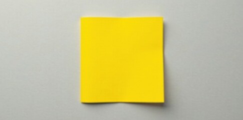 Fototapeta premium Simple yellow square brochure on gray background , yellow, square, design