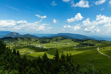 Velika Planina, Kamnik, Slovenia. Lord of the Rings style village. Wooden typical houses, hills,...