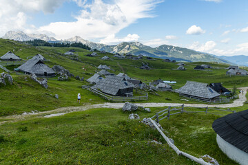 Velika Planina, Kamnik, Slovenia. Lord of the Rings style village. Wooden typical houses, hills,...