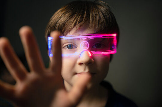 Child wearing smart glasses with glowing neon lights