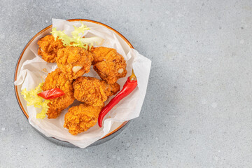 Fried Mozzarella Cheese Balls from the hot air fryer oven. appetizer on a light background, top view. copy space
