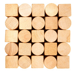 Wooden cubes and cylinders in an ordered pattern