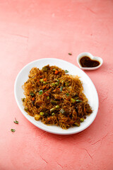 Asian noodles with vegetables and soy sauce