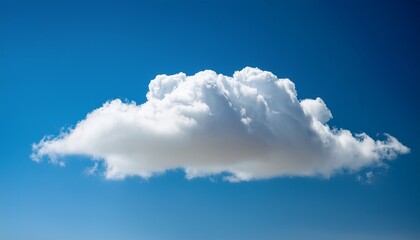 A detailed shot of a soft, puffy cloud in a bright blue sky, with natural light casting soft shadows and highlighting the fluffy texture of the cloud.