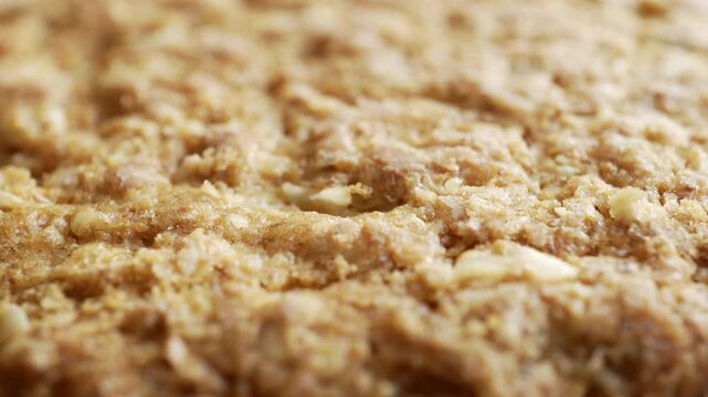 Oatmeal cookie in extreme close up stock footage