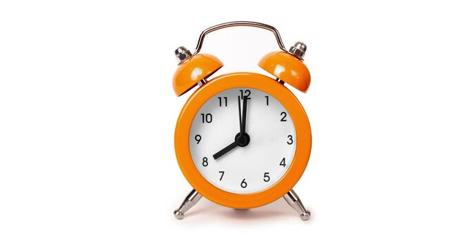 Orange The clock sets the time to 8.00. isolated on white background isolate
