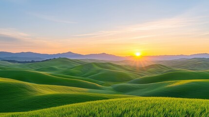 Obraz premium Spring season awakening concept. Vibrant green hills under a colorful sunset sky.