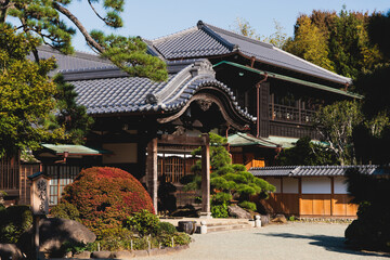 Gotokuji Temple in fall sunny day, Daikeizan Gotoku-ji in Setagaya ward, Tokyo, Japan, buddhist temple, Maneki-neko temple, with beckoning cat figurine toys, temple with japanese fortune lucky cats