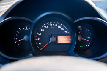 Car dashboard and speedometer inside car