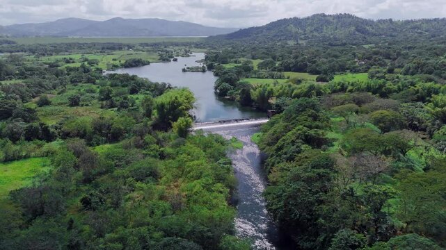 Agricultural irrigation dam, Hatillo, Cotui in Dominican Republic. Aerial forward descending