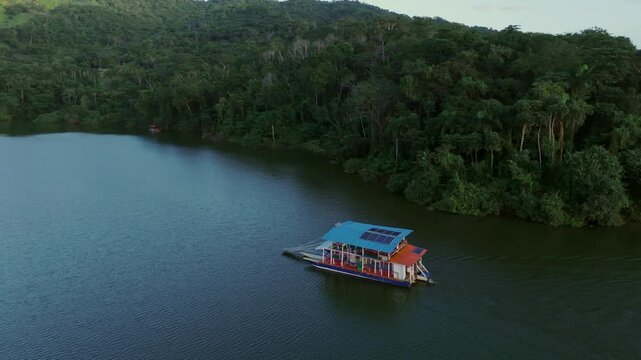 Orbit shot of Tour ferry at Hatillo dam, Cotui, Province of Sanchez Ramirez, Dominican Republic