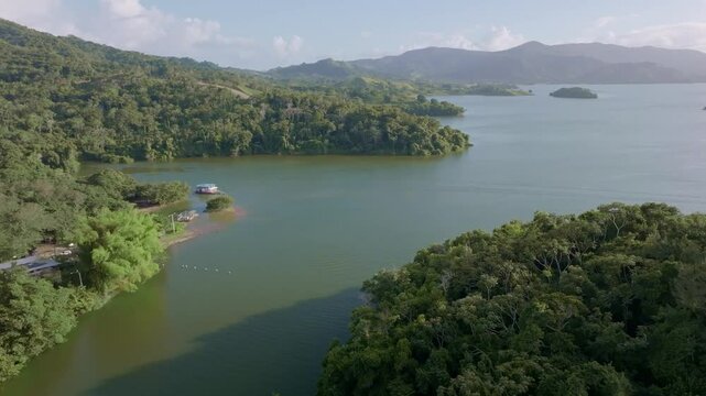 Hatillo Dam and vast reservoir, Dominican Republic. Aerial drone panoramic view