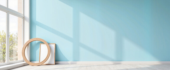 Modern circular picture frame against sky blue wall, minimalist decor