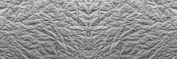 Mur gris clair au style froissé et granuleux, avec effet symétrique
