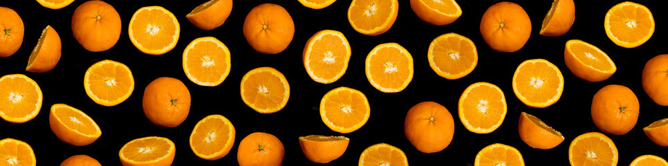 Banner with Vibrant and Colorful Oranges Sitting on a Black Background, Evoking Warmth and Freshness. High quality photo. healthy food