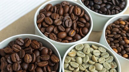 Fototapeta premium Elegant presentation of four bowls with coffee beans, displaying the progression of roast levels and the beauty of coffee in its different forms. Versatile image for luxury coffee brands and gourmet c
