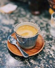 A beautifully crafted latte, featuring creamy foam art on top of rich espresso. Perfect for coffee-related projects, this image captures the warmth and inviting nature of a classic caf&eacute; experience.
