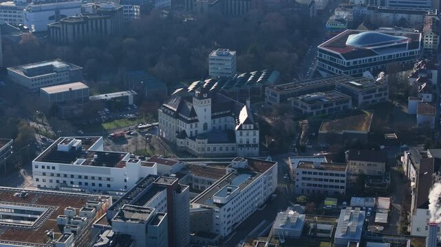 Aerial panorama revealing Stuttgart's architectural highlights, Linden Museum in Hegelplatz dominating modern metropolitan skyline