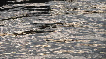 texture of blue river water with small waves