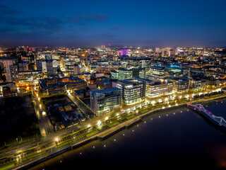 Fototapeta premium Night drone aerial drone illuminated downtown Glasgow city Scotland