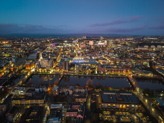 Fototapeta premium Night drone aerial drone illuminated downtown Glasgow city Scotland