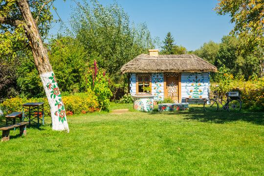 Polish folk art. Traditional  floral decorations on old wooden house. Zalipie, Poland