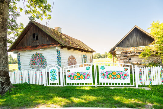 Polish folk art. Traditional  floral decorations on old wooden house. Zalipie, Poland