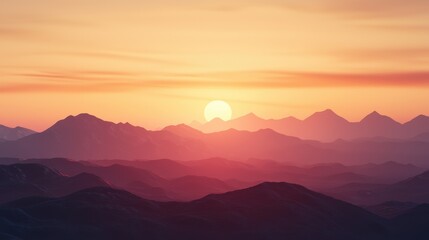 Obraz premium Serene Sunset Over Majestic Mountain Range on Clear Evening Sky