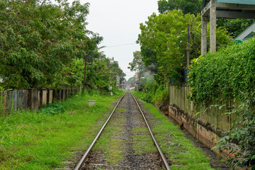 In Negombo, Sri Lanka, there is a railway line that runs through a residential area.