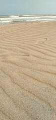 Waves on the sand
