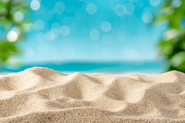 Obraz premium Abstract beach background with bokeh and sun flare, light blue and golden colors, white space at the bottom for text or product display