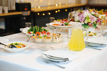 Fototapeta premium A served festive table with a variety of snacks and drinks. catering for a holiday.