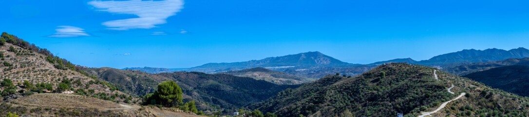 Panoramic view on picturesque typical Spanish village with cozy white houses in Yunquera, Andalusia, Spain