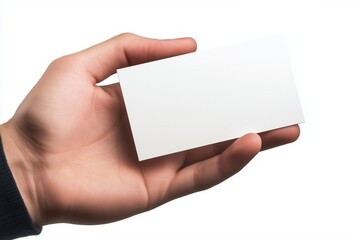 Obraz premium Human hand presenting blank business card on isolated white background. Mockup design.