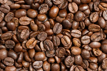 Keuken foto achterwand Caffeine-free decaf coffee beans close-up top view © Zarina Lukash