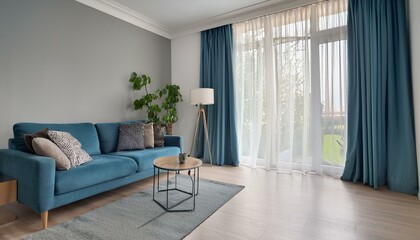 high definition image of a stylish living room with blue curtains light grey walls and modern decor including a plant in the corner