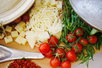 Food on a large served table. a variety of treats and snacks. catering for a banquet or buffet.