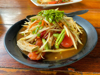 Jungle som tam, Thai spicy papaya salad with Vietnamese sausage