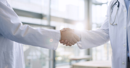 Handshake, doctors and partnership in healthcare for collaboration, hospital onboarding and....