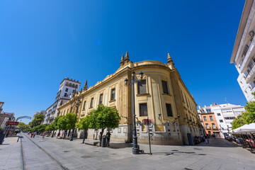 Naklejka premium Seville, Spain - August 01, 2024: Walking the streets of the old town of Seville, Spain.