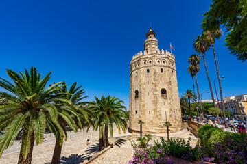 Fototapeta premium Seville, Spain - August 01, 2024: Torre del Oro Tower of Gold in Seville 