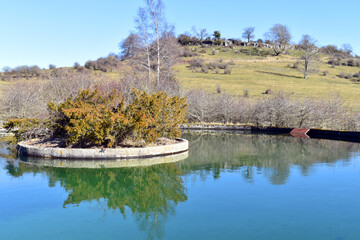 Water tank for livestock in the meadows of Legaire.