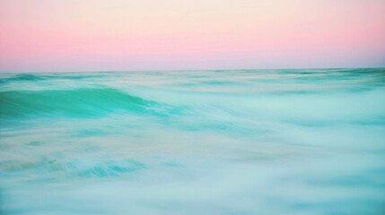 Fototapeta premium Serene ocean waves with pastel sunset for tranquil design