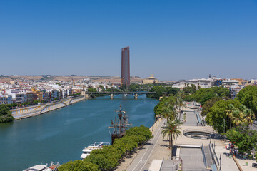 Seville, Spain - August 01, 2024: Guadalquivir river cityscape, Seville, Spain