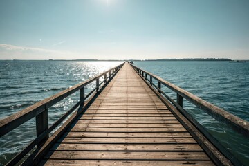 Wooden pier stretching into the distance with sunlight reflecting off its surface, scenery, wood, pier, beach