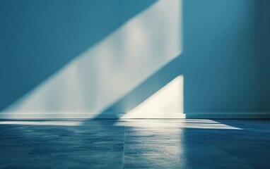 Dark blue corner wall and floor in room with sunlight shining from window outside.