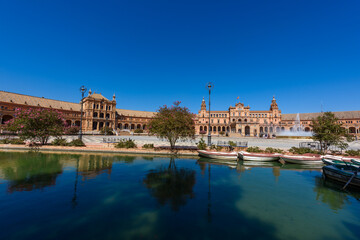 Sevilla, Spain - August 01, 2024: Plaza de Espana in Seville, Andalusia. The Plaza de Espana, built in 1928, is a plaza in the Parque de Maria Luisa in Seville, Spain.